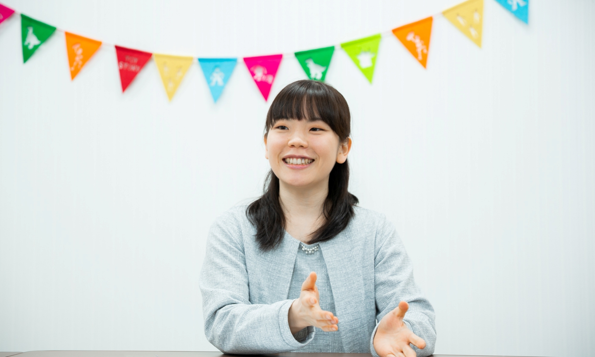 溝部聡子（みぞべ・さとこ）さん。乳児院保育士を経て、「センターさくら」統括責任者に就任。社会福祉士、公認心理師の資格も取得。市民吹奏楽団でトランペットを担当。